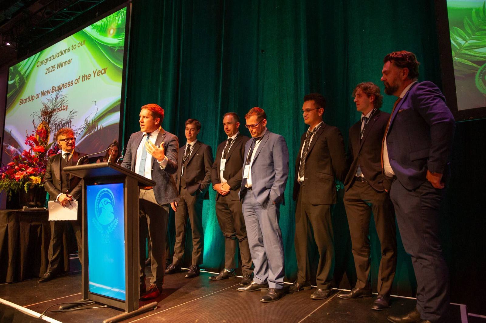The CyberTeam team on stage at the iSANZ 2025 awards, accepting the Start Up / New Business award